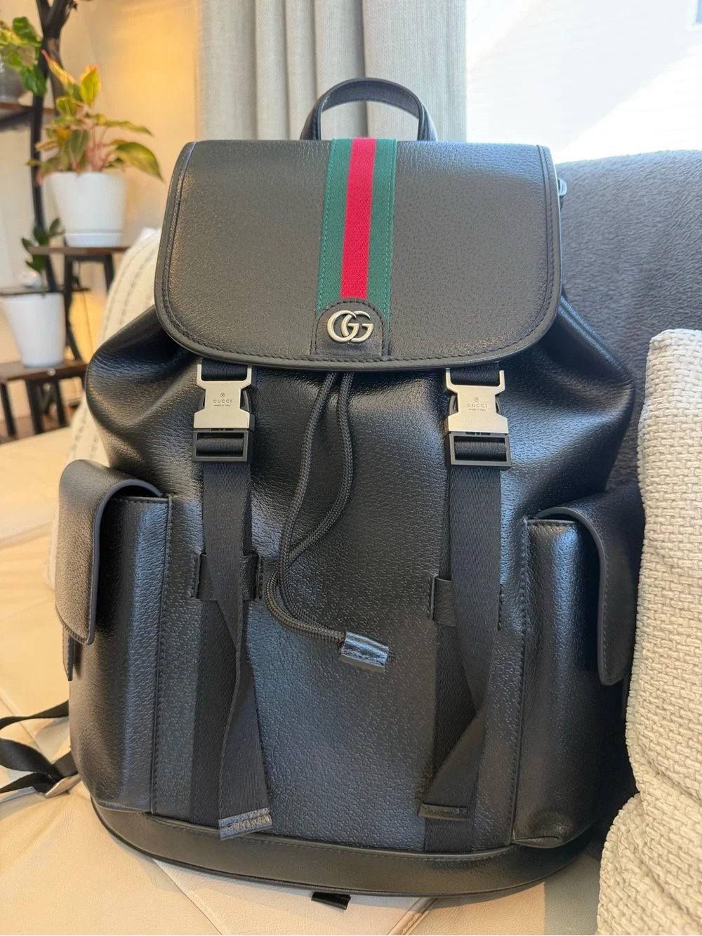Used Black Leather Backpack with Signature Green-Red Stripe